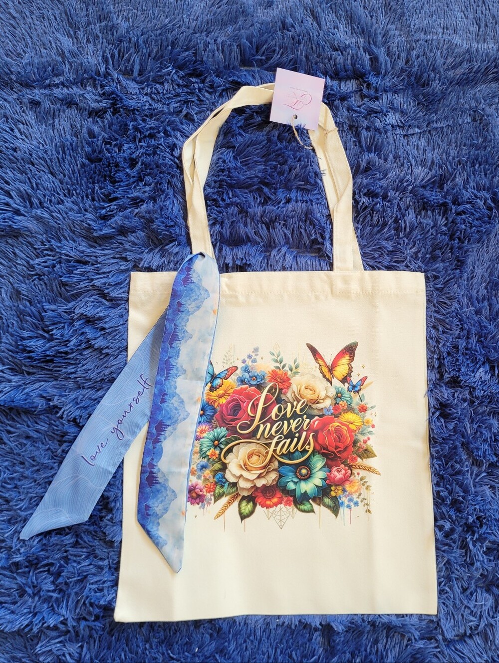 Love Never Fails' Canvas Tote Bag With Sash